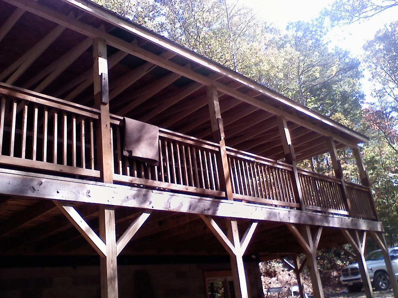 Timber framing under a new elevated porch and deck — Roof Leak Repair in Little Mountain by Roofing Brothers